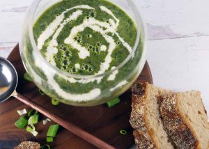 Kale and pea soup with crema by Roaring Spork