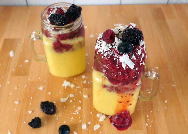 Tart triple berry smoothie with Mango by Roaring Spork