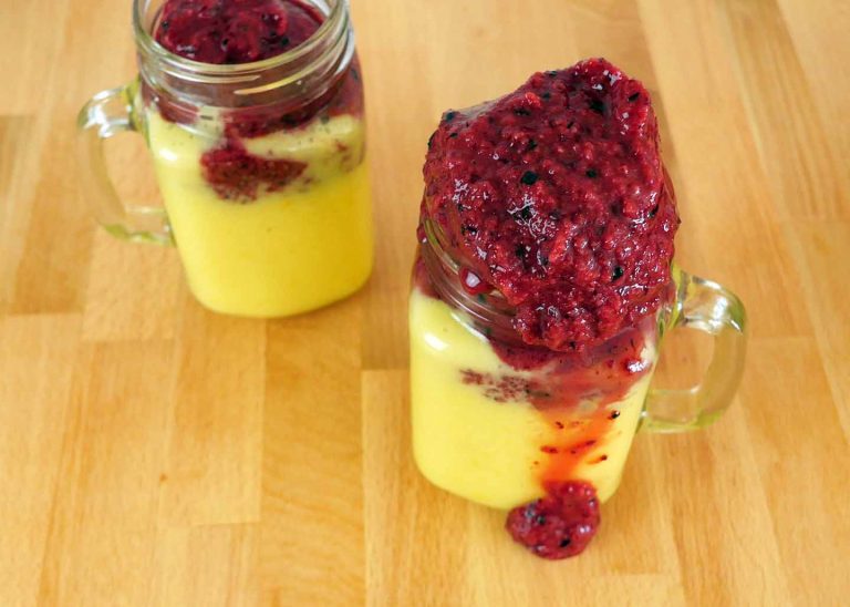Mango and tart triple berry smoothie by Roaring Spork